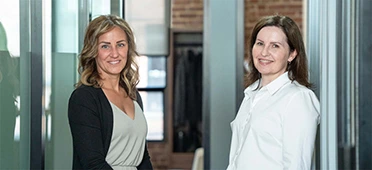 MacGillivray Injury and Insurance Law team looking at the camera